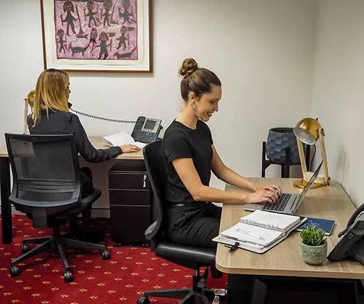 Coworking freedom in Emirates Towers, Duba, were two ladies are working 